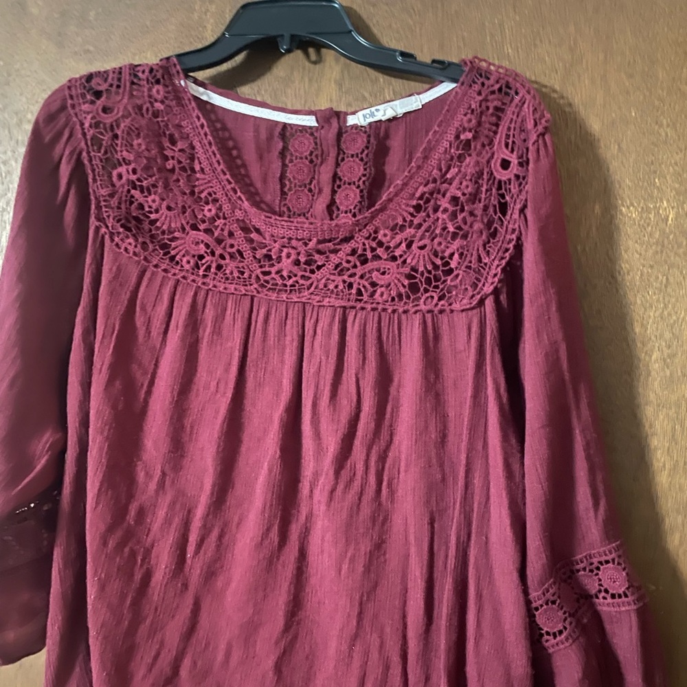 Maroon top with crochet detail